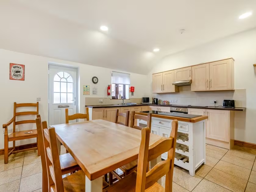 kitchen and dining are of holiday cottage 2 at epworth fields holiday park in lincolnshire
